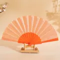 Ventaglio pieghevole glitterato arancione da 7 pollici con stecche in plastica e supporto - 7" / Arancione
