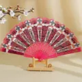 Elegante abanico español rosa con estampado dorado y refinado diseño de encaje - 23cm / Rosa rojo