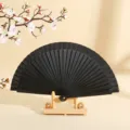 Abanico español plegable de madera negro minimalista con soporte de madera natural - Negro