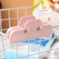 Durable pink plastic food bag sealer clip for moisture-proof kitchen snack storage - Pink