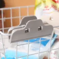Grey plastic food bag sealing clip for kitchen storage and effective moisture protection - Gray