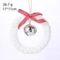 Handmade white braided Christmas wreath ornament with red striped bow and silver bell - White