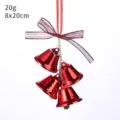Red metallic Christmas bell hanging ornament with decorative striped ribbon bow - Red