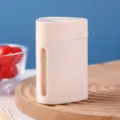 Elegant cream-colored automatic pop-up toothpick box with a sleek minimalist design - Cream