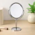 High-definition double-sided rotatable vanity mirror with elegant silver metal frame - Oval