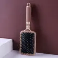 Professional champagne gold paddle hairbrush with anti-static bristles for scalp massage - Square Paddle Brush