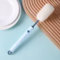 Weiße Schwamm-Tassenbürste mit langem blauem Griff und praktischem Aufhängeloch für Küche - Blau