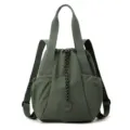 Dark green lightweight nylon drawstring handbag for women featuring dual shoulder straps - M / Matcha Green