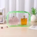 Durable clear PVC travel makeup organizer bag with stylish neon green piping and zipper - Green