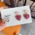 Close-up detail of high-quality pink enamel heart earrings with sparkling rhinestones - Heart (E0083) / Pink