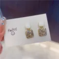 Close-up of white enamel square earrings with full rhinestone detailing. - Square (E0083) / White