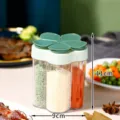 5-in-1 compartment seasoning jar with green petal-shaped lid, measuring 11cm by 9cm. - Green