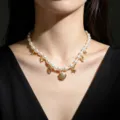 Elegante collana di perle con ciondoli dorati a forma di stella marina e conchiglia - Stile Perla Artificiale Oro Conchiglia e Stella Marina (2)