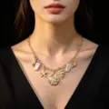 Elegante collana dorata tema oceano con ciondoli a stella marina e conchiglia - Stile Catena Spessa Oro Conchiglia Stella Marina e Perla Artificiale (7)