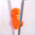 Oranger Duschkopfhalter mit starkem Saugnapf aus Kunststoff für die Badezimmerwand - Orange