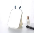 Elegant white folding desktop makeup mirror featuring charming blue rabbit ear accents - Rabbit Ear Decoration / White