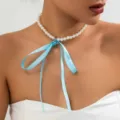 Detail of a French retro pearl choker necklace featuring a large light blue ribbon bow. - Single Layer Style (875619) / Blue