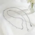 Elegante collana lunga a strati in catena a serpente argentata e perle da donna - Stile Medaglietta Rotonda Doppio Strato / Argento Paillettes