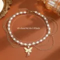Elegante collana a catena dorata a strati con perle finte e ciondolo farfalla con nappe. - Stile Giunzione Perla Farfalla Cava (11 Oro) / Oro