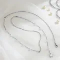 Elegante collana a catena di serpente argento con perle bianche e charm stella - Stile Pendente Stella / Stelle Argentate