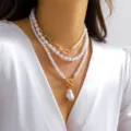 Elegant multi-layer Baroque pearl necklace with gold-tone chain and toggle clasp - Large Baroque Pearl Layered Necklace / Gold