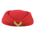 Close-up of a premium red stewardess beret featuring a golden leaf emblem decoration - Red