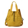 Lightweight yellow nylon drawstring tote bag for women with adjustable shoulder straps - M / Gilded Gold