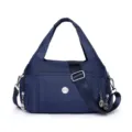 High-quality waterproof dark blue nylon handbag for women featuring large capacity travel style - Blue