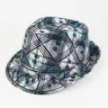 Close-up detail of blue and black plaid jazz hat with graffiti floral patterns - One Size (58cm) / Blue