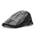 Side view of a vintage distressed denim flat cap with ripped texture details - Adjustable / Distressed Black