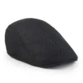 Detailed macro view of the breathable black mesh fabric on this summer flat cap ivy hat - One Size (58cm) / Black