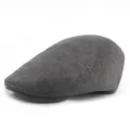 Side view of a vintage gray knit flat cap showing soft textured knitted fabric detail - Adjustable Elastic / Dark Gray