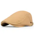 Close-up of a British retro khaki cotton flat cap with side metal adjustment buckle - Light Khaki