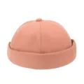 Vista ravvicinata del berretto docker rosa corallo che mostra la trama del twill - Regolabile / Rosa