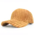 Macro detail of camel brown corduroy fabric on a stylish curved brim baseball cap - Adjustable / Khaki