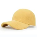 Macro view of yellow corduroy fabric on a classic baseball cap design - Adjustable / Yellow