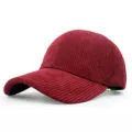 Macro view showing the detailed ribbed corduroy texture of a wine red baseball cap - Adjustable / Burgundy