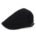 Side view of a classic black cotton flat cap with adjustable brass buckle detail. - Adjustable / Black