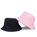 Wendbarer einfarbiger Fischerhut in Schwarz und Rosa für lässigen Sonnenschutz im Freien - Einheitsgröße / Wendbar / Rosa/Schwarz