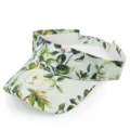 Detail of a faux silk open top sun visor with floral pear print and adjustable strap. - Adjustable / Light Green
