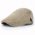 Side view detail of a vintage washed cotton flat cap featuring an adjustable metal buckle - Adjustable / Khaki