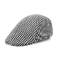 Detailed side view showing houndstooth wool fabric texture of a classic flat cap - One Size / Gray
