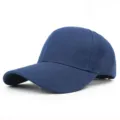 Detailed side view of a solid navy blue baseball cap with a classic curved brim design - 56-58cm (Adjustable) / Navy Blue