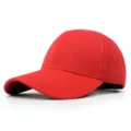 Side view detail of a vibrant red plain cotton baseball cap with curved brim - 56-58cm (Adjustable) / Red