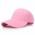 Close-up detail of a classic pink plain baseball cap with a sturdy curved brim design - 56-58cm (Adjustable) / Pink
