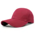 Detailed side view of a solid wine red baseball cap with high-quality twill texture - 56-58cm (Adjustable) / Burgundy
