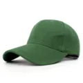 Side view showing details of a dark green blank baseball cap with a curved brim design - 56-58cm (Adjustable) / Green
