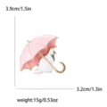 Enamel cat under pink umbrella brooch pin with dimensions 3.9x3.2cm - Pink