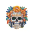Exquisite Day of the Dead skull brooch decorated with vibrant flowers and sparkling crystals - Orange & Blue