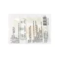 Vista detallada posterior del empaque del calentador de manos con instrucciones de uso - Patrón de vaca verde y amarillo (fundas térmicas para manos y pies) / 2 Piezas